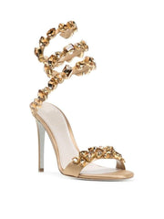 Elyra Snake Rhinestone Sandals In Gold